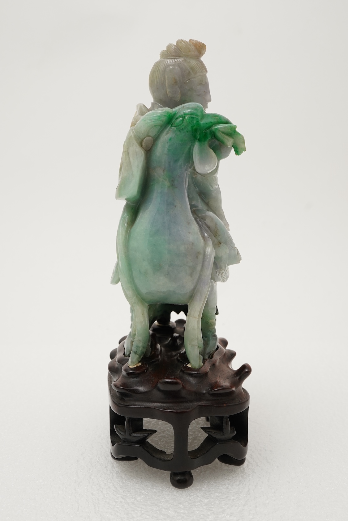 A Chinese jadeite figure of Xi Wangmu riding on a phoenix, late 19th/early 20th century